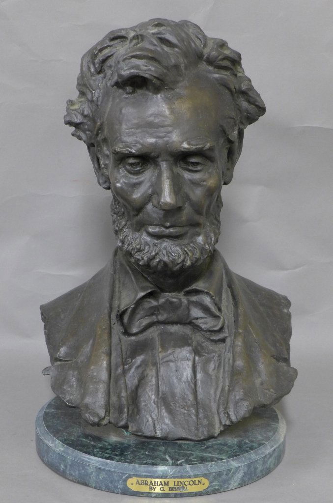 After George Edwin Bissell (1839-1920): Figural patinated bronze bust of Abraham Lincoln, the 16th president of the United States. He served from March 1861 until his assassination in April 1865. On green marble base with plaque that reads: