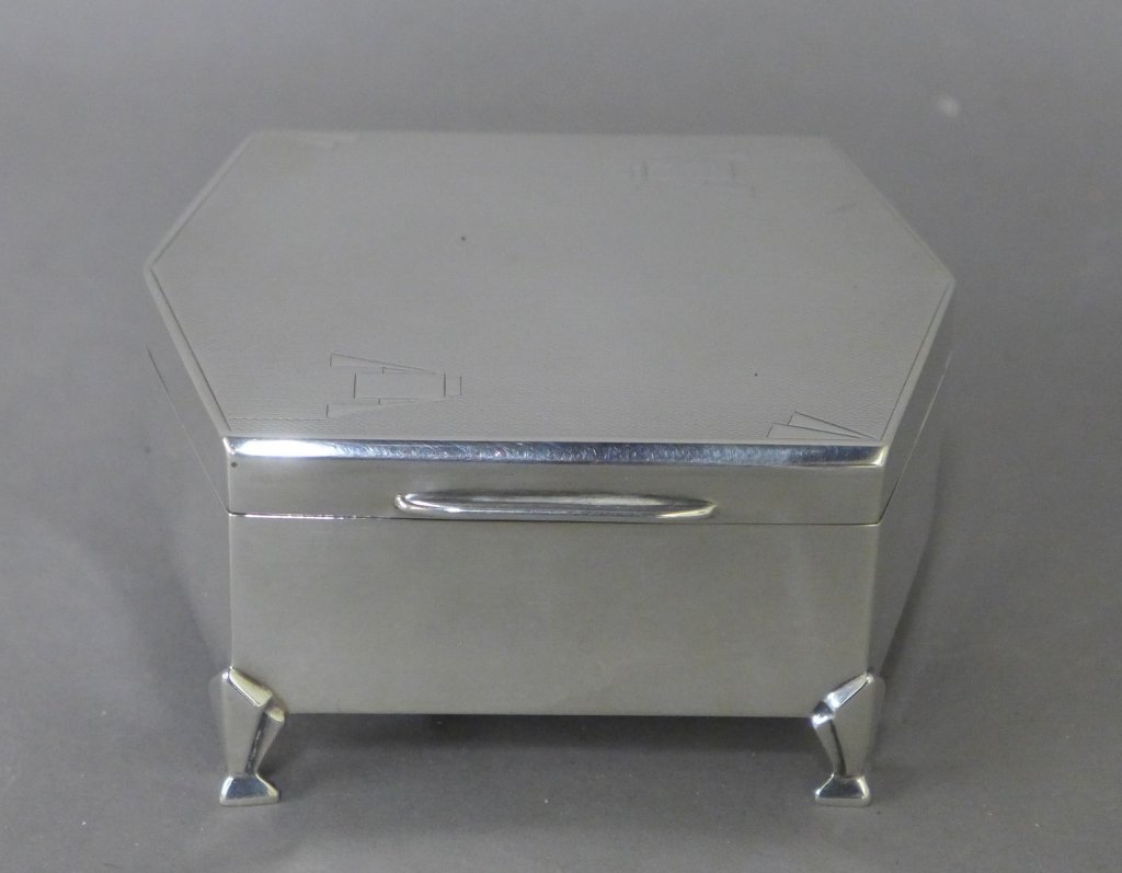 Sterling Silver Art Deco Box: Art Deco Walker & Hall Sheffield hinged box. Sterling silver box with velvet lining. Maker's marks/ hallmarks on side and bottom. In good overall condition. Height: 2", Width: 4", Depth: 3 3/8"