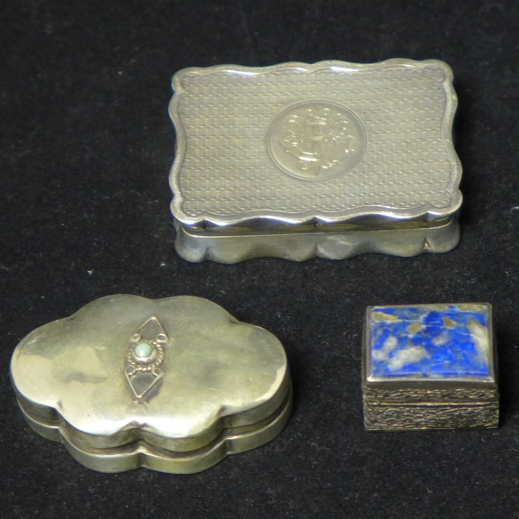Sterling Silver Hinged Boxes: 3 Sterling silver pill or trinket boxes. The largest box has a lion and anchor design with hallmarks inside. The medium box has marks: F.M. B. The smallest box has no noticeable maker's marks. The lid