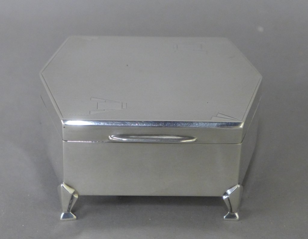 Sterling Silver Art Deco Box: Art Deco Walker & Hall Sheffield hinged box. Sterling silver box with velvet lining. Maker's marks/ hallmarks on side and bottom. In good overall condition. Height: 2", Width: 4", Depth: 3 3/8" STERLI