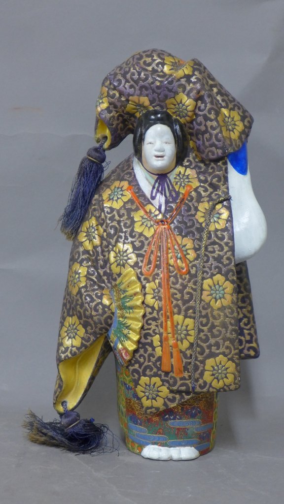 Asian Geisha Sculpture: Japanese art pottery/ composition figural statue. Hand painted figure with kimono and fan. Some old repairs. Tassel and rope details. Height: 11 1/2", Width: 6 1/2", Depth: 6 1/2"STERLING ASSOCIATES S