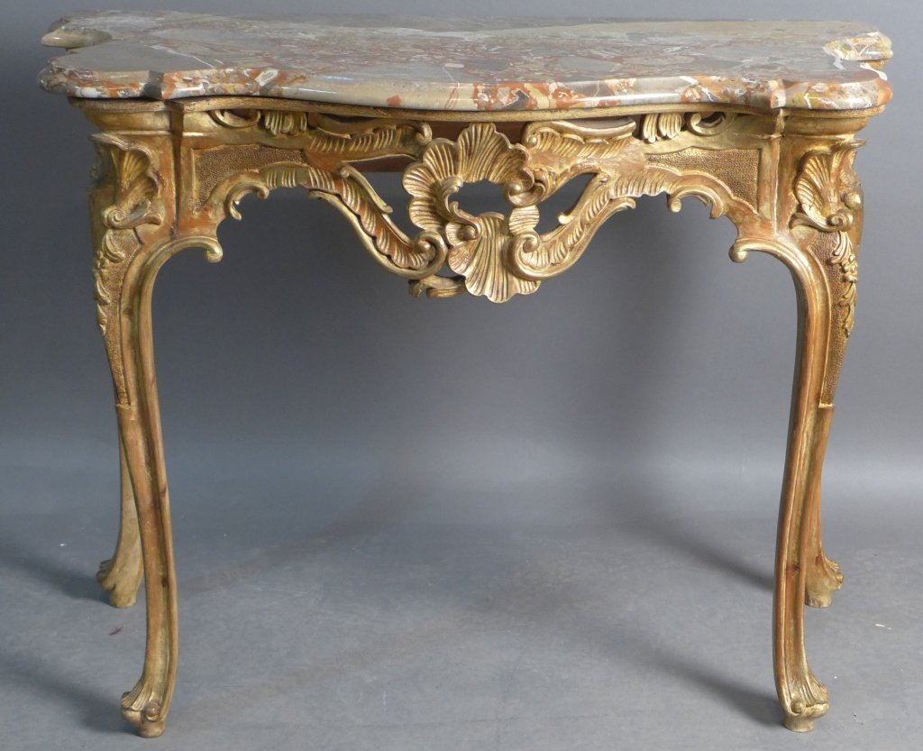 Marble Top Louis XV Style Console: Marble top and carved wood console table with gilt accents. Height: 35 3/4", Width: 46", Depth: 21" (furniture, ornate, table, gold) STERLING ASSOCIATES STRIVES TO PROVIDE ACCURATE, OBJECTIVE, & FAIR