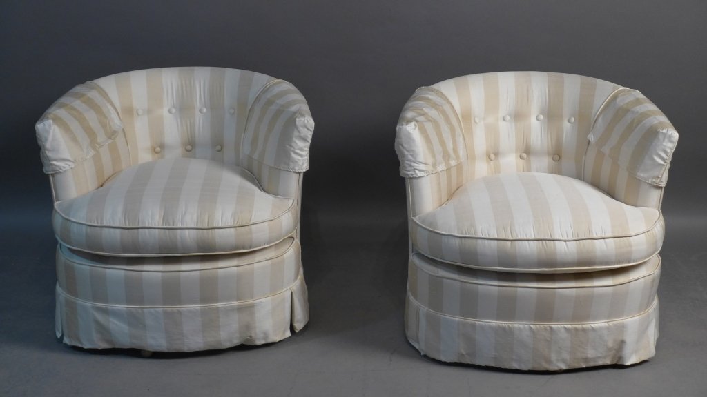 Pair Swivel Club Chairs: Pair striped upholstered swivel club chairs. Some discoloration on cushions. Height: 25 1/2", Width: 29 1/2", Depth: 32" (furniture, seat, seating, armchair) STERLING ASSOCIATES STRIVES TO PROVIDE ACC