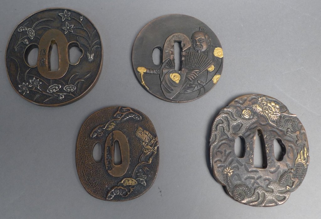 Set of Four Contemporary Tsuba Sword Guards: Set of four Contemporary Tsuba sword guards. Gilt over bronze. All are signed with character marks. Designs include dragon, flowers, tree and warrior. Height: 1/4", Width: 3 1/4", Depth: 3" (Asian, an