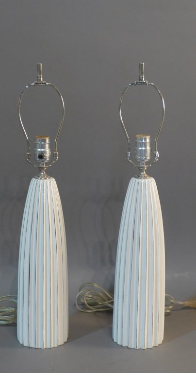 Pair of Modern Danghyra Italian Lamps: Matching set of two white glazed porcelain lamps. Made in Italy. Edges have silver accents. Maker's mark on bottom. No visible damage. Height: 24", Width: 4 1/4" (light, lighting, electric, ceramic, a