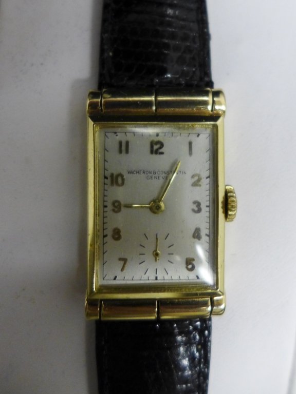 Vacheron Constantin Wrist Watch: Vacheron Constantin Geneve Swiss wrist watch with leather band. Adjusted to temperatures. Makers mark on Back. 14K casing. Band reads: "Debeer Paris Genuine Lizard Hand Made 18". Seventeen (17) jewelr
