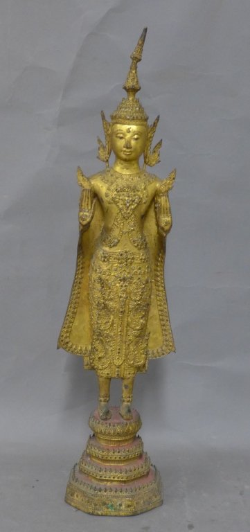 Chinese Gilt Statue: Asian/ Chinese/ Indonesian gilt (possibly over bronze) figural sculpture of a deity on base. Age appropriate wear all over. Mirror accents (some missing). No noticeable maker's marks. Figure is loose 