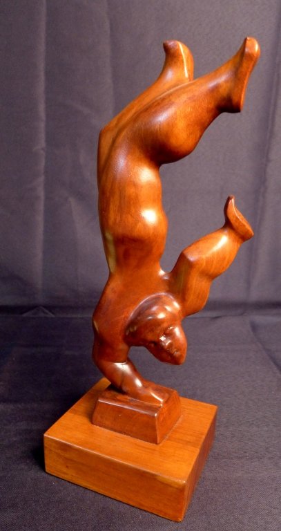 Chaim Gross, American (1904- 1991): "Acrobat" Hand carved wood sculpture of stylized male. Abstract modern art. Signed Chaim Gross as well as Limited Edition Robinson Galleries, Inc, New York. Height: 15", Width: 5 1/2", Depth: 4 3/4" (