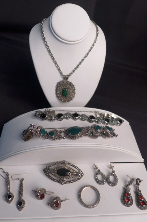 Art Deco Sterling Silver Jewelry: Sterling silver, onyx, marcasite and gemstone jewelry assortment. Collection includes 4 pairs of earrings, 1 ring, 1 brooch, 2 bracelets and 1 necklace. Size of ring is approx 9 1/2". (art deco, art n