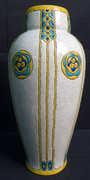 Charles Catteau Vase Oriental Nuage: Art Deco vase by Boch Freres designed by Charles Catteau at Atelier de Fantasie. Vase depicts a polychrome design with highly stylized flowers using crackled enamels on earthenware. Vase is signed B.F