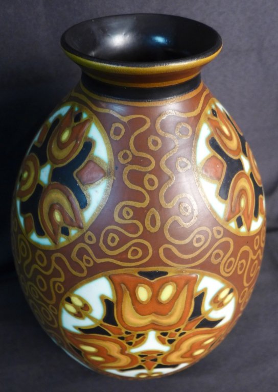 Charles Catteau Art Deco Vase: Stunning and rare Art Deco vase by Boch Freres designed by Charles Catteau at Atelier de Fantasie. Vase is stylized with a heavy floral motif. Made with matte enamels on earthenware. Signed Boch Frere