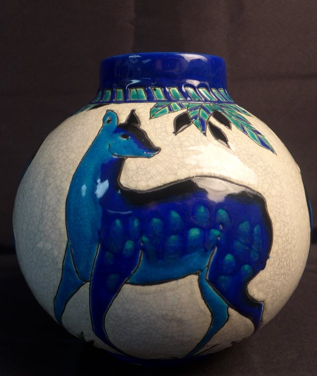 Charles Catteau Daims Vase: Art Deco round vase with stylized deer design. Beautiful shades of blue enamel on white background. Signed on bottom: Ch. Catteau and Keramis made in Belgium & design number: d.943. Stamped with from