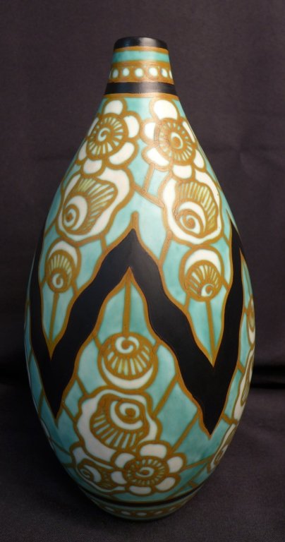 Charles Catteau Art Deco Vase: Art Deco vase by Boch Freres designed by Charles Catteau, Jan Wind and Leon Lambillotte at Atelier de Fantasie. Vase depicts a heavily stylized floral motif using matte enamels on earthenware. Vase is