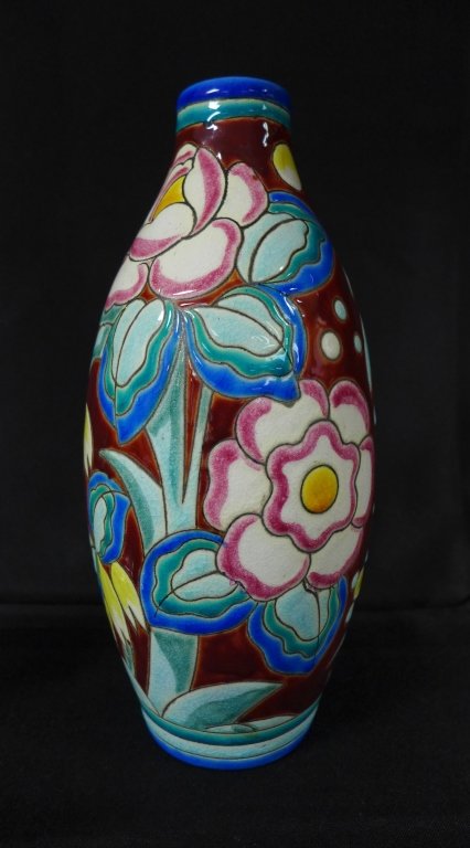 Charles Catteau Art Deco Vase: Art Deco vase by Boch Freres designed by Charles Catteau at Atelier de Fantasie. Vase depicts a polychrome design with a stylized floral pattern on a rich brown background using crackled enamels on ea
