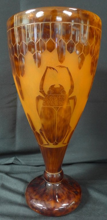 Le Verre Francais Scarabees Vase: Stunning Art Deco vase by Le Verre Francais and designed by the artist Charles Schneider. This vase is done in a vivid orange glass overlaid with violet glass featuring a scarab beetle pattern and res