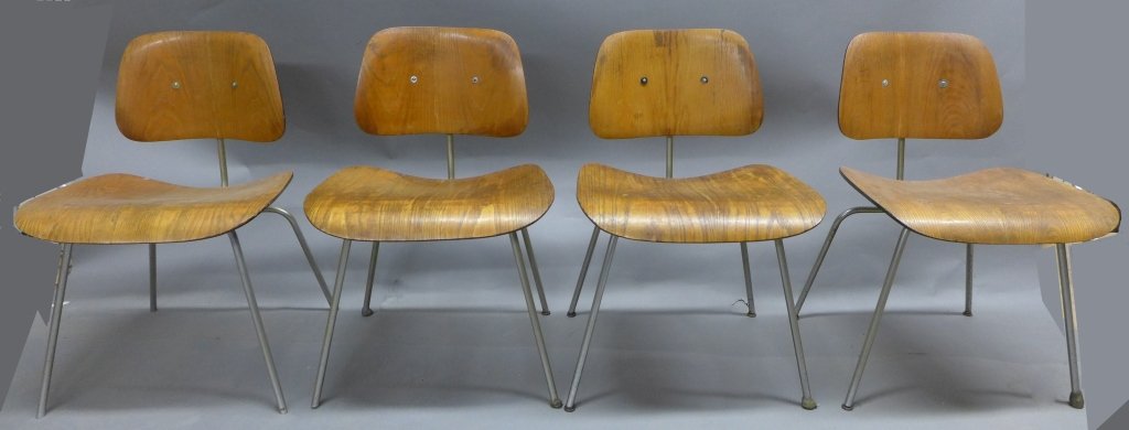 Set of 4 Charles Eames for Herman Miller Chairs: Set of 4 Charles & Ray Eames for Herman Miller DCM Chairs . Molded plywood iconic chairs. Herman Miller labels on back. Imperfections & wear. Height: 28 3/4", Width: 19 3/8"; Depth: 19"(mid century, m