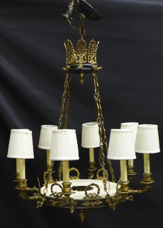 Spanish Brass Chandelier with Shades: Beautiful black pan chandelier with brass accents. 8 brass arms with accompanying shades. Electrified. Height: 36", Width: 25" (lighting, antique, vintage, electrical) STERLING ASSOCIATES STRIVES TO P
