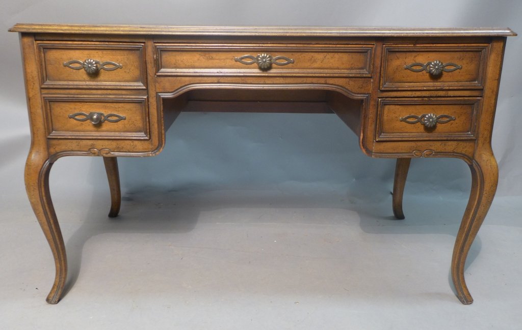 Leather Top Wood Desk by Sligh & Lowry: Beautiful American 4 drawer desk with leather top. Leather has gilt tooled boarder. Some wear and imperfections. Maker's mark in middle drawer reads: Sligh & Lowry Holland, Michigan. Height: 29", Widt