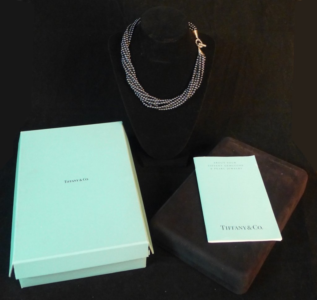 Tiffany & Co. 8 Strand Hematite Necklace: Tiffany & Co. 8 Strand Hematite Necklace. Sterling silver toggle closure with hematite torsade beads. 4.3mm beads. Marked. Legnth: 17". Weight: 160 gramsOriginal case, box and booklet included. STERLI