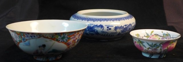 Asian Porcelain Bowls: Assortment of 3 Asian studio art pottery pieces include 1 blue and white bowl with dragon design and maker's mark on bottom. Small bowl with fruit design on interior as well as exterior also has signa