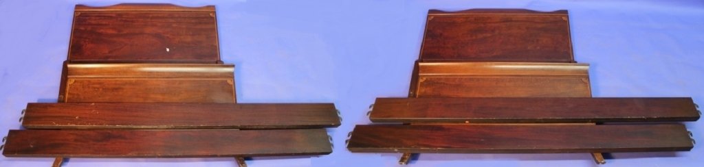 Set of 2 Mahogany Inlayed Wood Beds: Set of 2 elegant mahogany beds. Great combination of curved and straight line with rich deep color and lighter wood inlays in the corners. Has 5 bed slats. Scratches, dents on the sides and legs. Impe
