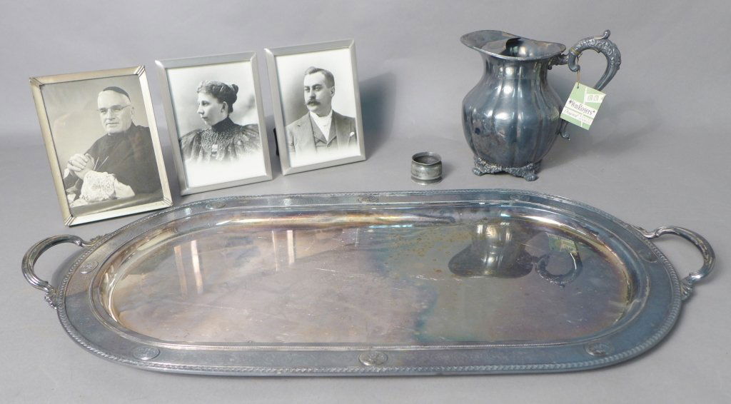 Group of Silver Tone Decorative Objects: Silver tone group of decorative objects. Including large silver plate tray with two handles and decorative boarder made by International / Meriden Bordeaux pattern, vintage William Rogers Silver plate