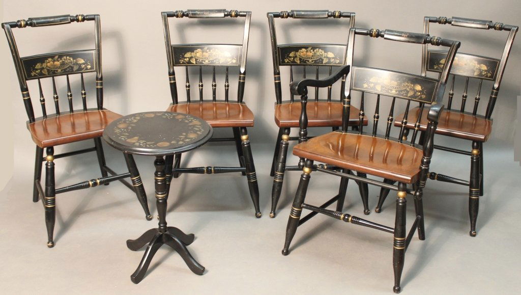 Set of 5 Hitchcock Chairs and Table: Set of 5 stenciled Hitchcock chairs and matching tilt top table. Includes 4 side chairs and one arm chair painted with golden rosettes and fruits with natural wood seats. Tilt top table has a painted/