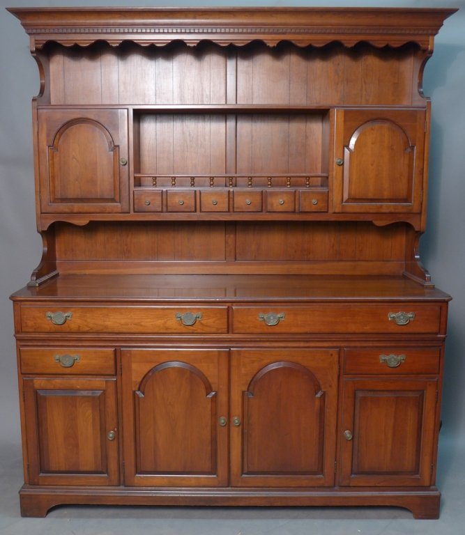 Pennsylvania House Two Piece Buffet & Hutch: Two piece cherry buffet & hutch made by Pennsylvania House furniture manufactory. The top part has a pronounce straight cornice over two open shelves with plate grooves, two cabinets with doors and th