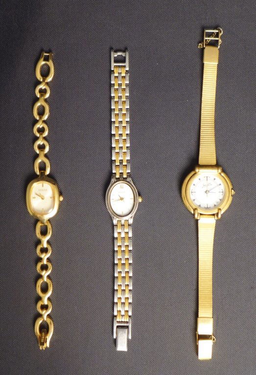 Assortment of Women's Watch: Assortment of three woman's watch. One gold tone Jean D`Eve watch, one two tone Pulsar watch, one gold tone Guess watch. Some scratches. Imperfections. Largest dimensions: Length: 6 1/2" (ladies, jewe