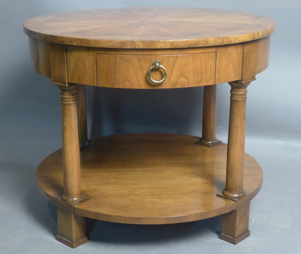 Baker Furniture Accent Table: Round wood end table with drawer. Maker's mark reads: Baker's Furniture. Table top sits on column shaped and lower self. legs Height: 22 1/8", Width: 27", Depth: 27" (furniture, star burst pattern, mi