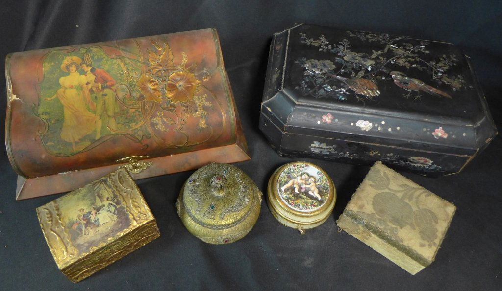 Collection of Decorative Boxes: Collection of 6 decorative boxes including 1 round musical movement pull string music box wall hanging. Music box has sweet figural design with winged cherubs. Jewelry box with mother of pearl inlay h