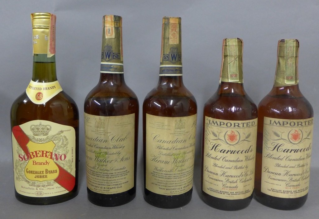5 Bottles of Vintage Liqour, Whiskey & Brandy: Collection of 4 bottles of Canadian Whiskey and 1 Soberano Brandy. 2 bottles of Canadian Club Blended Whiskey were distilled and blended by Hiram Walker & Sons Limited. At the time of bottling the whi