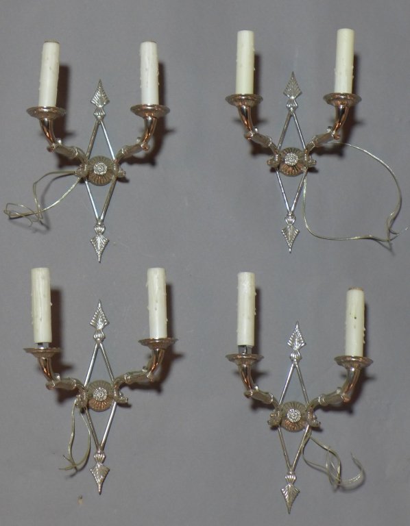 Art Deco Wall Sconces: Grouping of 4 nickel over bronze wall sconces with diamond shaped bodies. . Continental. Electrified. Slight imperfections. Height: 12", Width: 8", Depth: 5 1/2" (art deco, art nouveau, lighting, elec