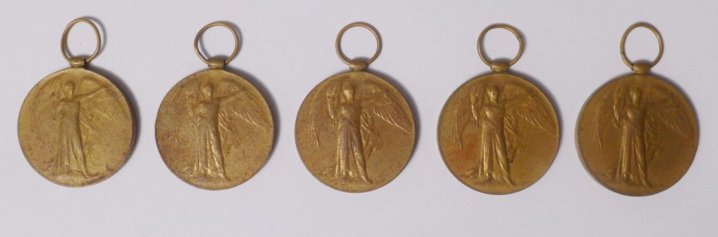 Set of 5 British WWI Victory Medals: Set of 5 British WWI Victory Medals with no ribbons. Each rim engraved: "1098 Sep. Mohsin All. Shanghai Rif.", "897 Cpl. Woin Chau Tientsin Vols", Seargent. Chin Fee Wei Hei Wei Vols.", "57961 Pte. F.