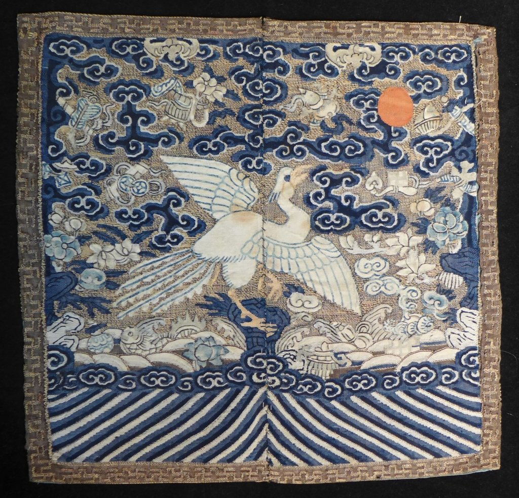 Imperial Chinese Mandarin Rank Badge: Imperial Chinese Mandarin Rank Badge. Features large bird in center surrounded by clouds, bats, flowers, lanterns, a sun disk and more. Possible 2nd Rank (pheasant). Embroidered squares that were sewn