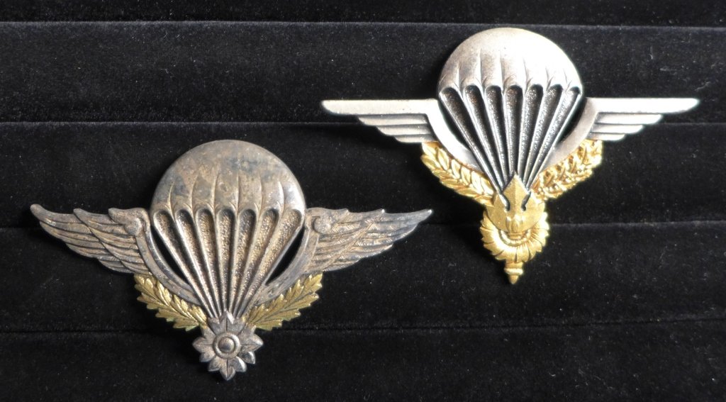 Indochina Paratrooper Jump Wings: Pair of French Foreign Legion Paratrooper Jump Wings. Indochina. Includes: Laos Airborne Parachutist Jump Wings Badge and Cambodia - Parachutist Jump Wing Badge. Height: 2" ; Width: 3". Age appropriat