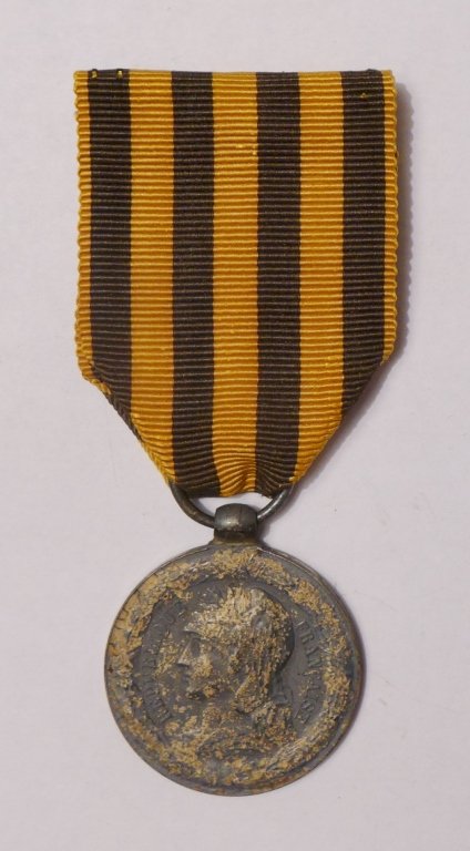 Silver Dahomey Expedition Commemorative Medal 1892: Silver Dahomey Expedition commemorative medal 1892 was a French colonial medal. It was given to the participants of the First Franco-Dahomean War (1890) and the Second Franco-Dahomean War (1892–1894