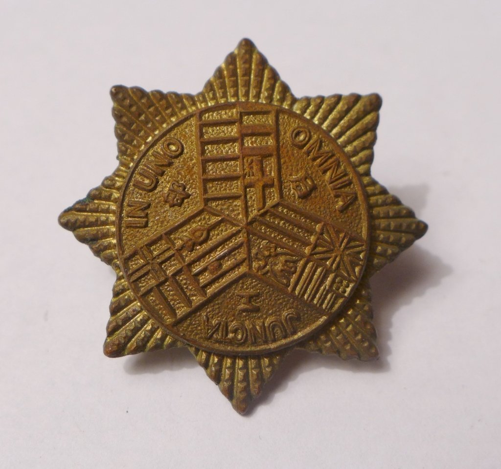 Shanghai Municipal Police Collar Badge: Shanghai Municipal Police Collar badge. Featuring eight point star incorporating flags of all nations. Middle circle part raised from the star points. Imperfections. Diameter: 1 3/16" From Gene Christ