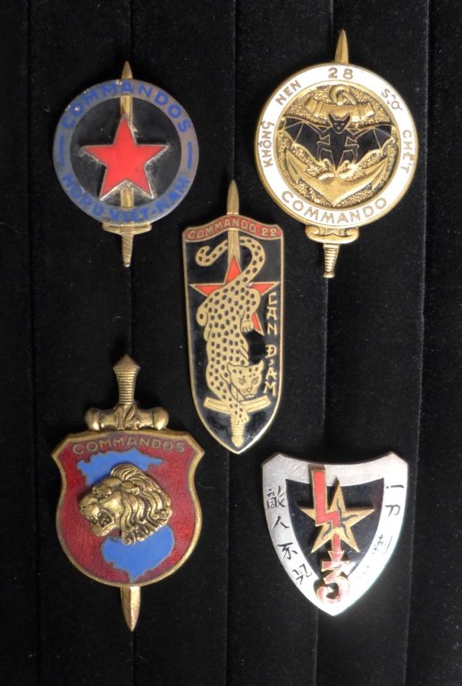 Badge Insignia of North Viet Nam Commandos: Badge insignias of the Indochina and North Viet Nam commandos of the French Foreign Legion. Includes: Commandos NORTH VIETNAM, Commando 3, 14 Commando, lion head, 22 Commando, CAN-DAM, Commando 28 and