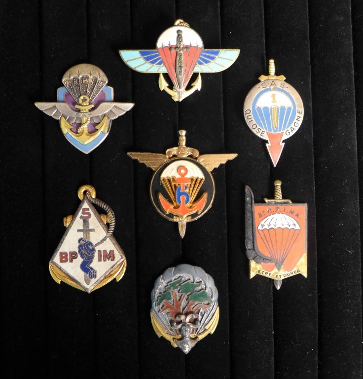 Col. & Marine Infantry Parachute Regiment Badge: 7 French paratrooper badges of Colonial and Marine Infantry Parachute Regiments. Includes: 1st, 2nd, 5th, 6th & 7th Marine Infantry Parachute Regiment and 1st Regiment interarme overseas. Height: 2" ;
