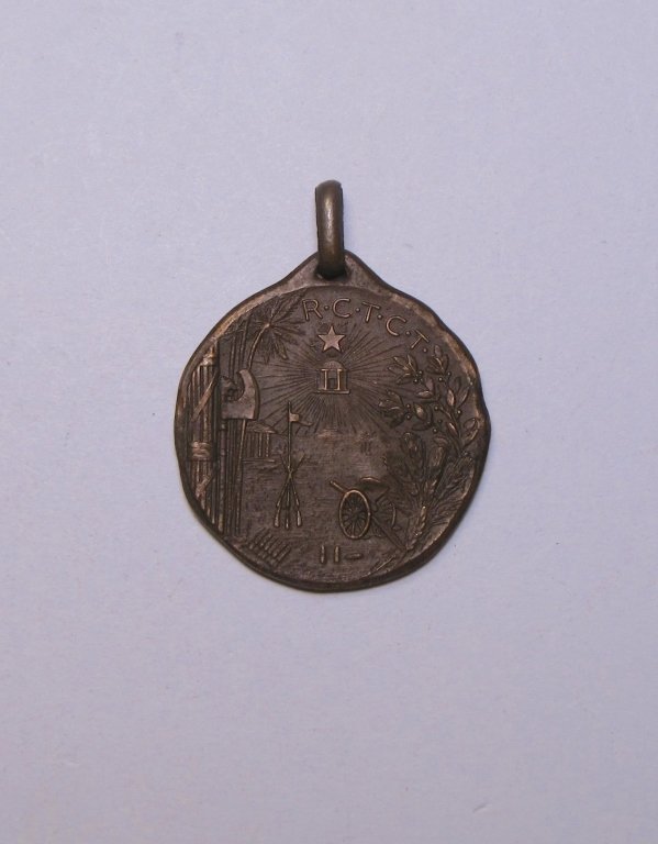 Bronze Medal of Royal Corps of Colonial Africa: Bronze Medal of Royal Corps of Colonial Africa. The obverse is depicting a scenery of trees, canon, flag, weapons and 5 point star, signed "R.C.T.C.T". The reverse is depicting a Royal insignia and si
