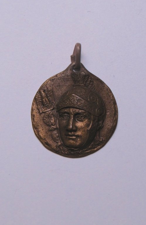 Bronze Medal of 219th Battalion CC.NN. Cirene: Bronze Medal of 219th Battalion CC.NN. Cirene, Colonial Africa. The obverse is depicting a head of a warrior in Roman armor. The reverse signed "7 Divisione CC.NN. / Cirene / 219 / Battaglione / Vis C