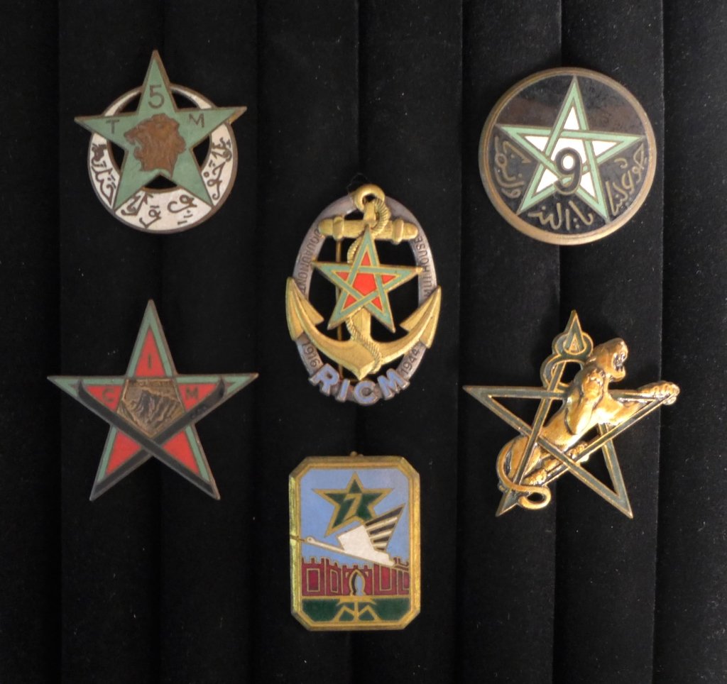 Badge Insignias Riflemen Regiments of Moroccans: French Foreign Legion Badge Insignias of The Riflemen Regiments of Moroccans. Includes: BTM 6th - 2nd Battalion march, 7 R.T.M, 8 R.T.M, 9th Rifle Regiment Moroccans, Training Centre Mountain - OUKAIM