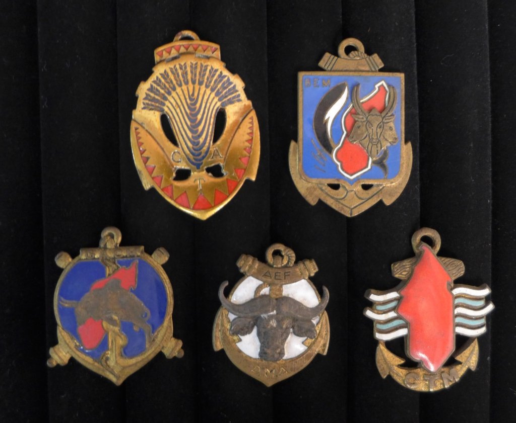 French Foreign Legion Badges of Madagascar: French Foreign Legion Badges of Madagascar. Includes: Battalion European Colo Of Madagascar (BEM), Artillery variants - Colonial Artillery Group Emyre Madagascar, COLONIAL TROOPS - DMA AEF, Insignia c