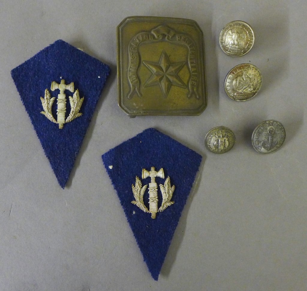 Jail Supervisor Collar Tabs, Buttons & Buckle: Group of French Guyana prison supervisor collar tabs, belt buckle & buttons. Including: -Set of two hand made Penitentiary Supervisors patches, featuring Ivy / oak leaves and double sided axe made of 