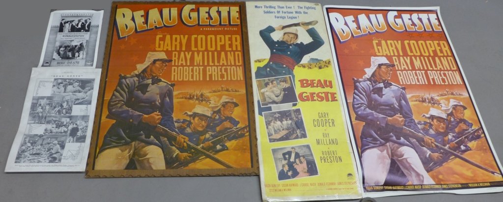 Beau Geste Movie Posters and Memorabilia: Collection of Beau Geste Movie Posters and Memorabilia. Includes: wood-mounted and paper one-sheets featuring Gary Cooper, Gazette sheet from July 26, 1939 and a black and white, two sided ad sheet fe