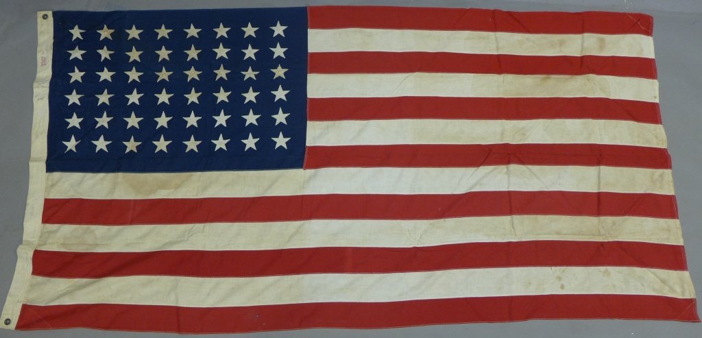 48 Stars American Flag: Vintage American Flag. 48 Stars and 13 stripes. Label reads: Defiance Reg. U.S. Pat. Off. 2 Ply. Moth Proof Bunting. Some discoloration. Length: 88", Width" 45" ( WW1, WW2, War, Military, America, USA