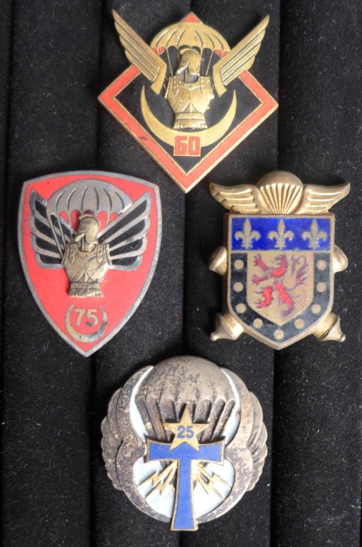 Selection of 4 Airborne FFL Badge Insignia: Selection of 4 Airborne French Foreign Legion Badge Insignia.Includes: 25th Airborne Division Signal Company, 75th Airborne Engineering Company and more. Maker marks.From the collection of Gene Christ