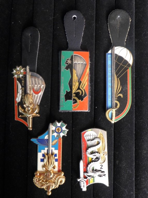 FFL Parachutist School Promotion Badges: Collection of five French Foreign Legion School Promotion Badges. Includes: SLT Carado, CNE Bergot, LT Borgniet, LT De Stabenrath & ADC Crestek. (St Cyr, France)Possible re-strikes.Maker marks.From th