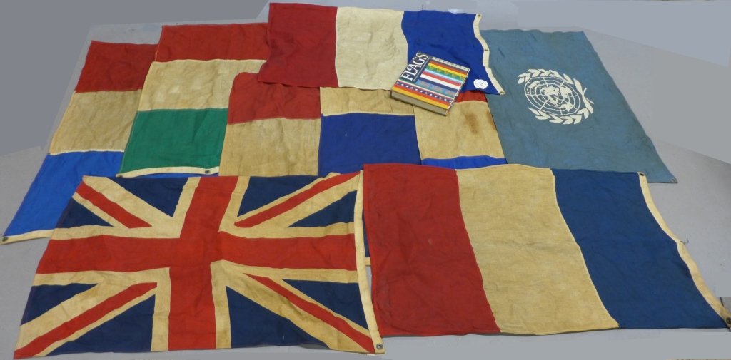 Collection of 9 Vintage International Flags & Book: Collection of 9 Vintage / Period International Flags, pin and a book on Flags._x000D_ Flags include: France, Italy, Great Britain and United Nations Flag (with one pin)._x000D_ Also includes: Flags Th